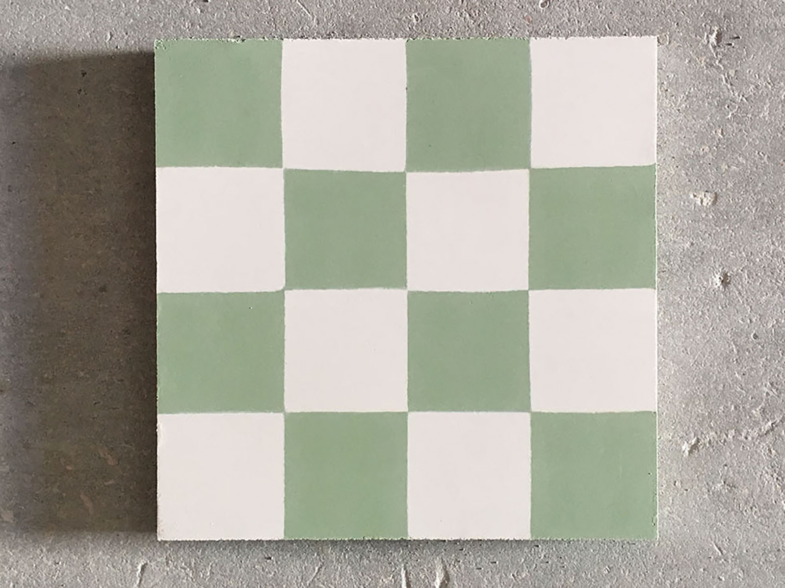 Losa hidráulica con forma de tablero de ajedrez