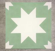 Mosáico artesano geométrico con repertorio de estrellas de ocho picos en verde y blanco