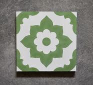 Baldosa floral hidráulica con forma de pétalo en color verde y blanco