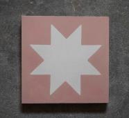 Baldosa hidráulica geométrica con estrella de ocho puntas en rosa