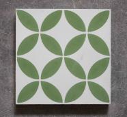 Mosáico artesano vanguardista con tonos veraniegos formando una flor en verde
